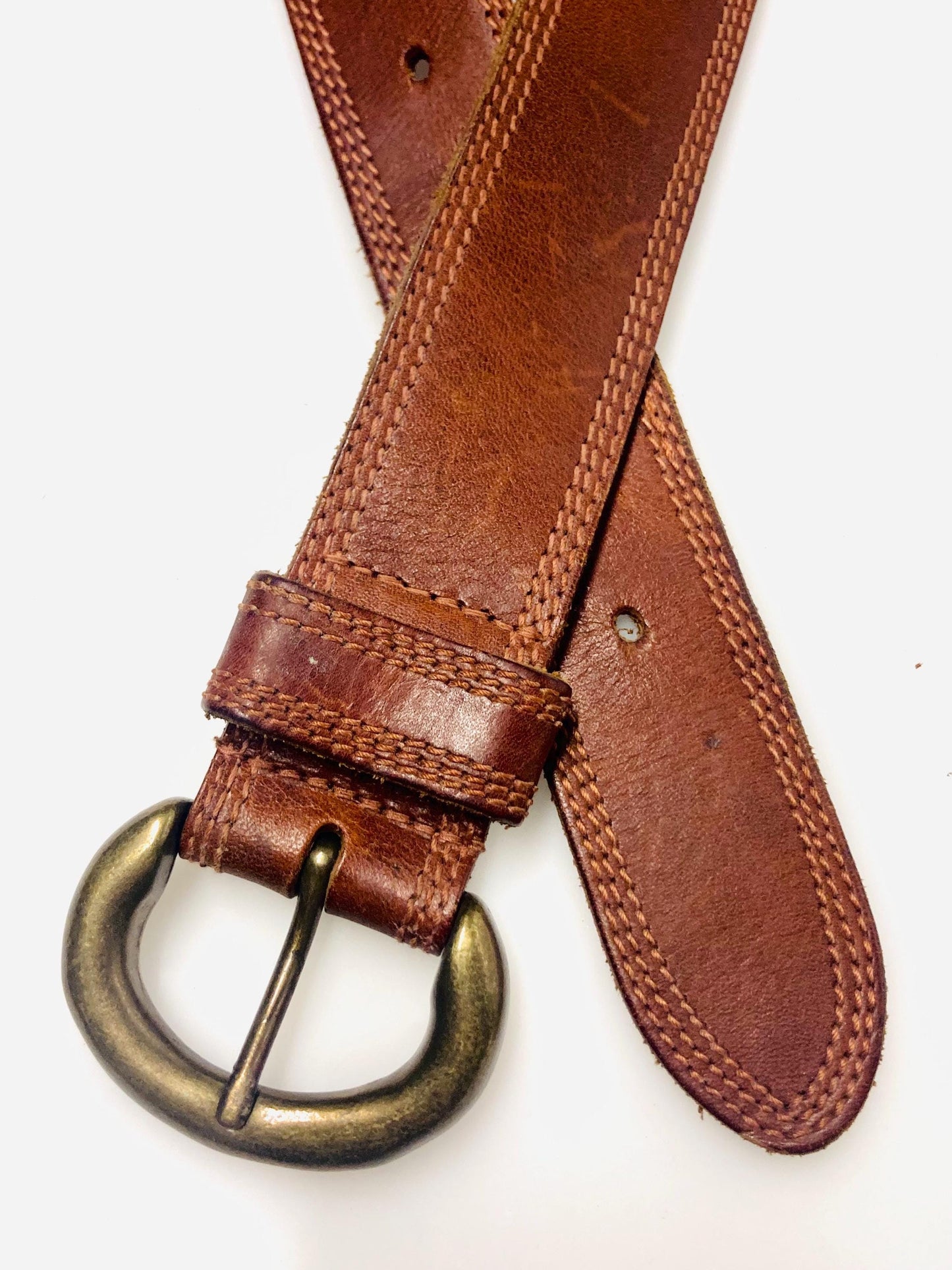 80s vintage jeans or trousers belt with brass buckle. Tan brown substantial single cut genuine leather construction with triple stitching