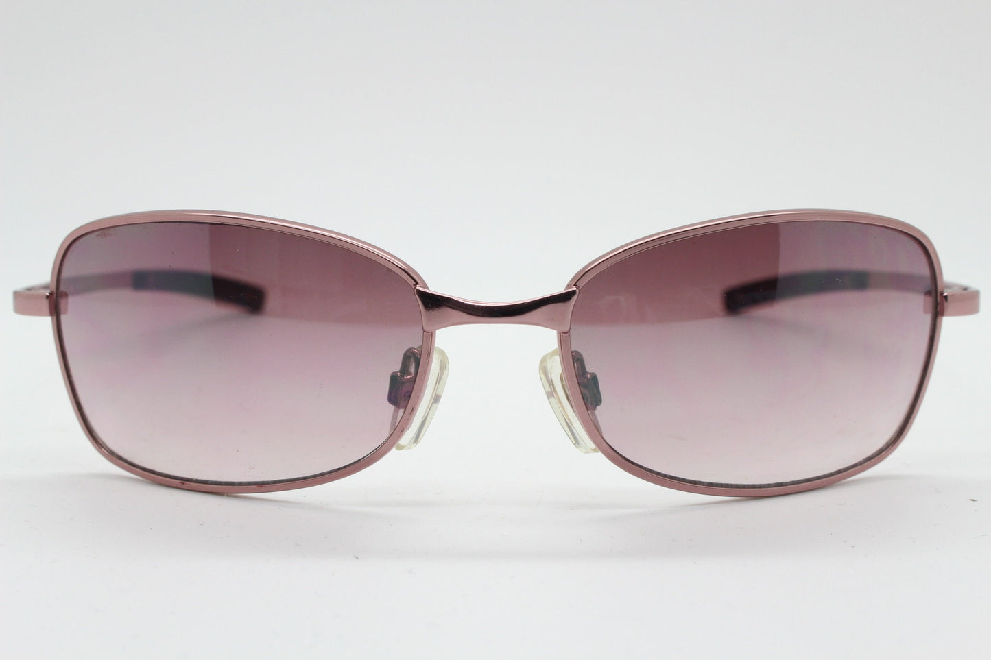 Y2K vintage curved sunglasses. Unusual Pink chrome metal frame with matching flared rectangular lenses. Unused 2000s NOS