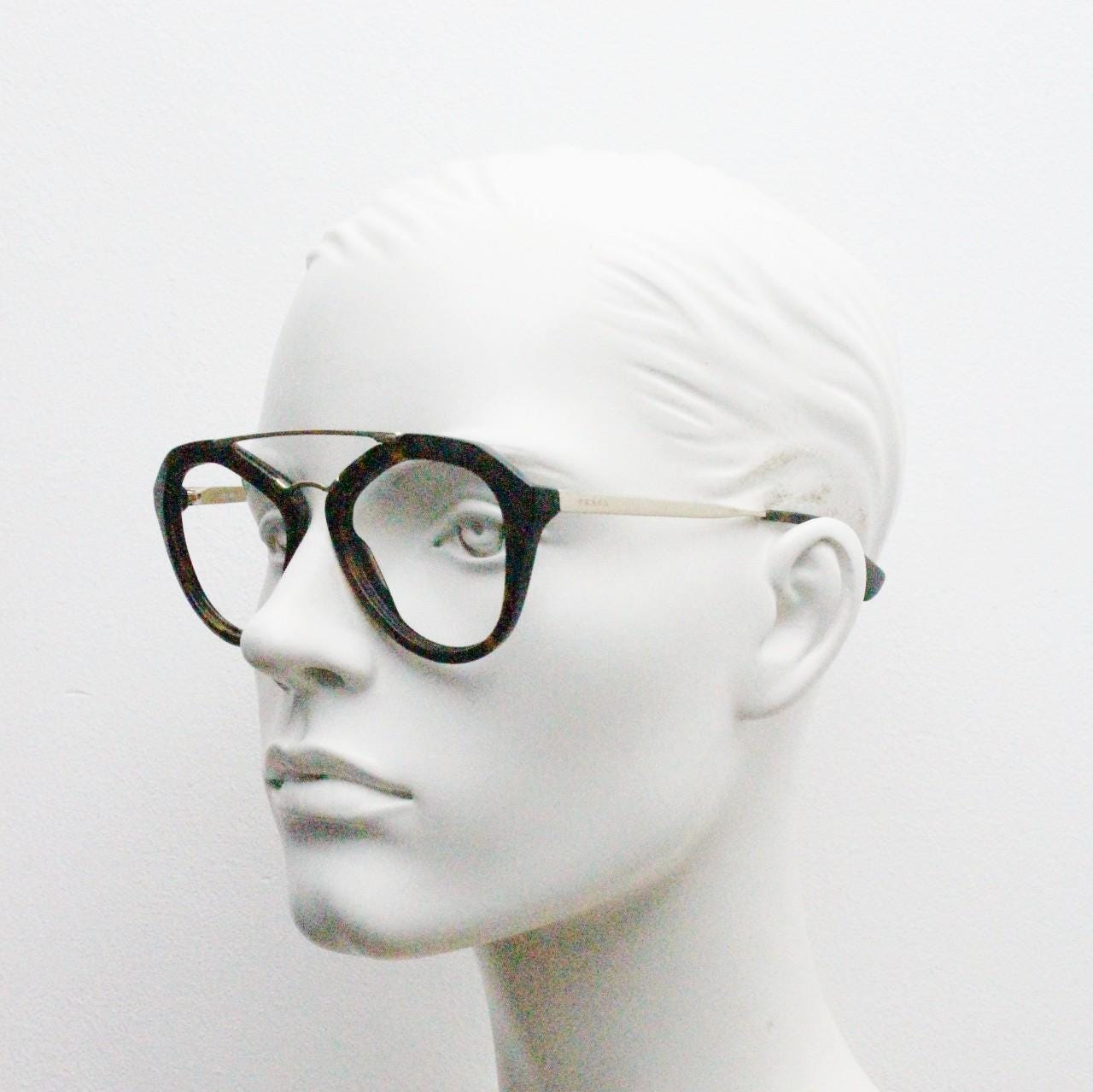Prada angular eye glasses made in Italy. Thick tortoise acetate optical frames with prominent gold double bridge. Prescription. RX