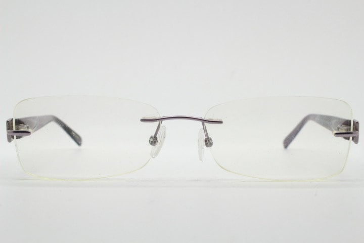 Givenchy rectangular frameless eye glasses made in Italy. Minimal optical frame with marbled brown arms. Prescription RX spectacles. Vintage