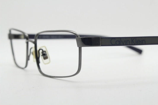Calvin Klein collection rectangular eye glasses model 582 made in Japan. Gunmetal grey wire optical frames. Prescription eyeglasses. RX