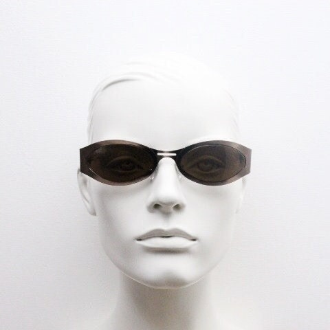 2000s vintage wraparound angular sunglasses. Brown chrome flat curved metal frame with cut out arms. 90s. Y2K unused NOS