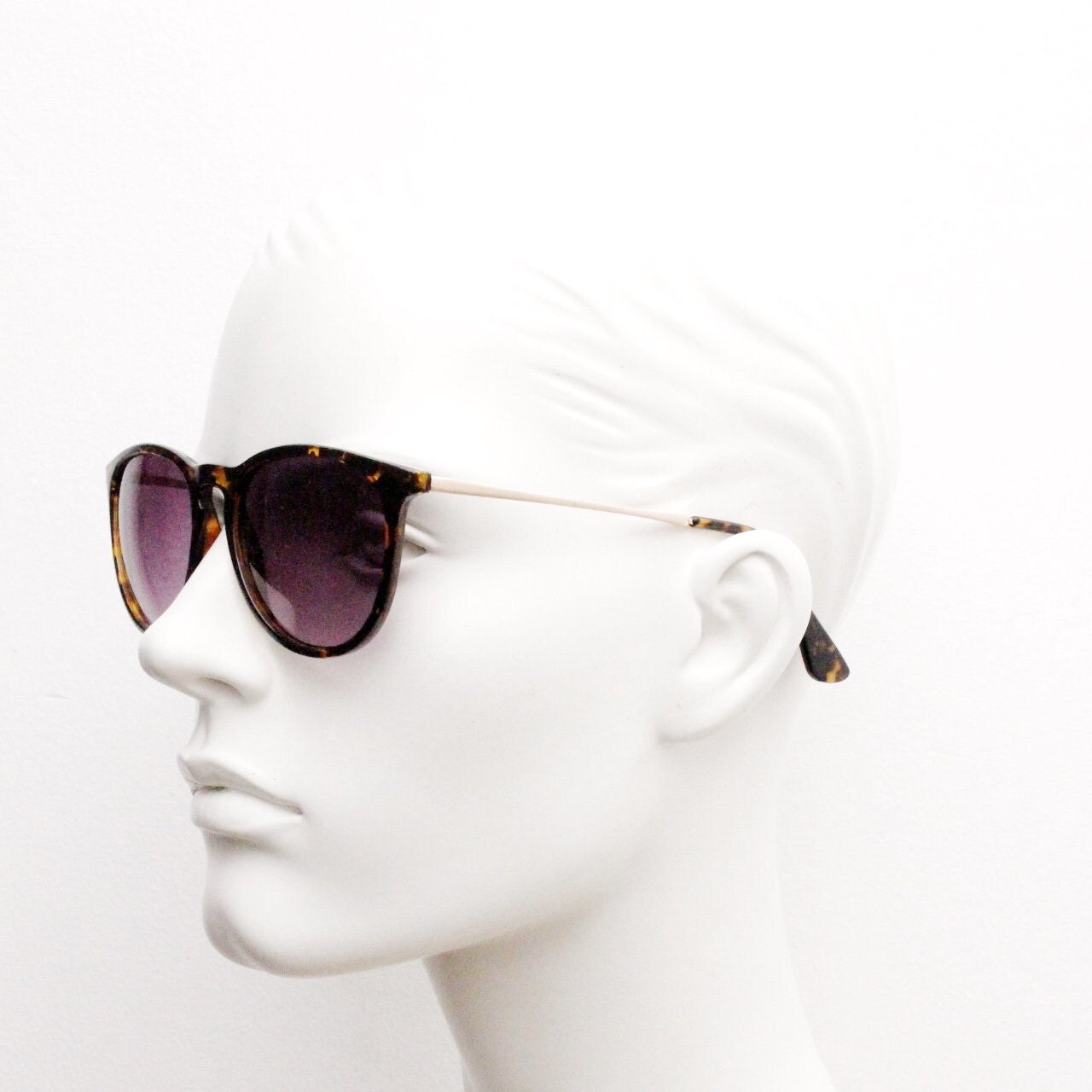 90s vintage sunglasses. Tortoise gloss frame with graduating black lenses and contrasting gold arms. Unused NOS