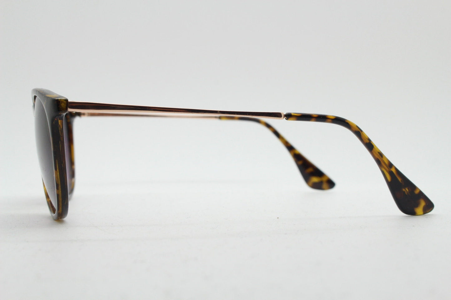 90s vintage sunglasses. Tortoise gloss frame with graduating black lenses and contrasting gold arms. Unused NOS