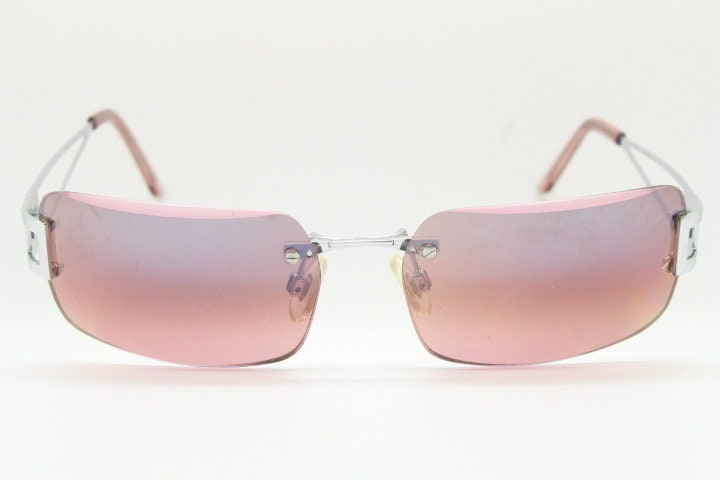 Y2K vintage rectangle frameless visor sunglasses. 2000's chrome trim wrap around with pink curved and bevelled lenses. 00's NOS