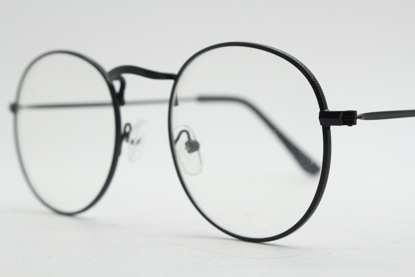 90s vintage round metal glasses. Classic 60s panto design black frame with clear lenses in excellent proportions. Unused NOS eyeglasses
