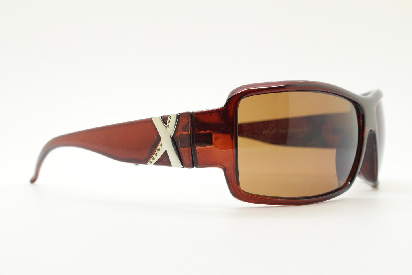 Y2K vintage visor sunglasses. Transparent brown wrap around shield with curved lenses and big X crest. 2000s biker bug eye. NOS