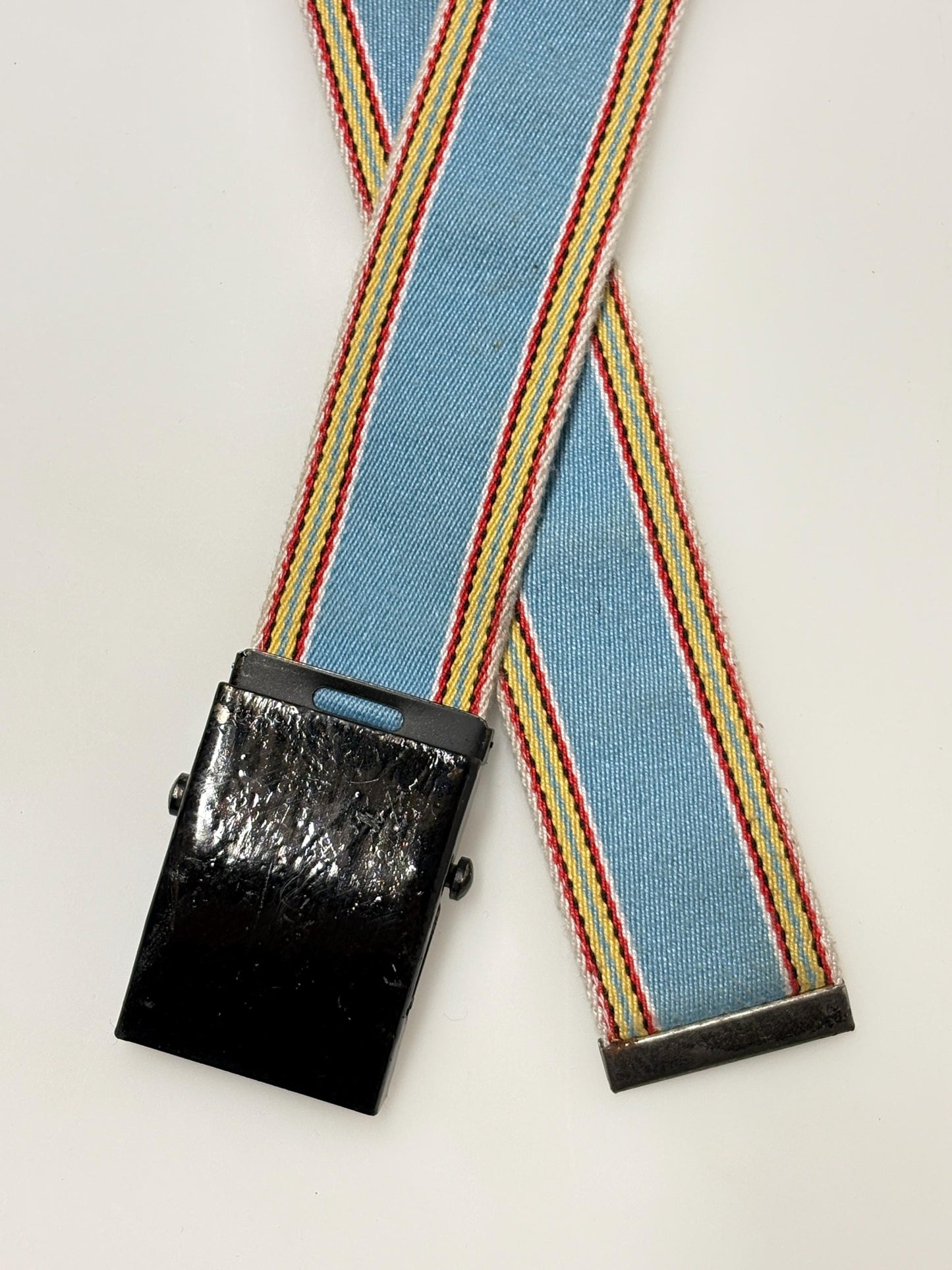 Y2K vintage 2' canvas army style belt in sky blue with red, white and yellow rainbow stripes. 2000s Mens large. Fully adjustable size range