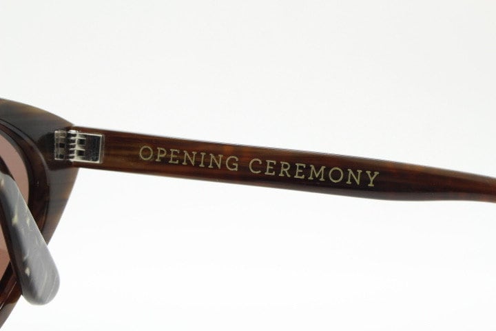 Opening Ceremony pointed cateye sunglasses. Womens classical cat eye marbled brown frame. Vintage. NOS. Y2K