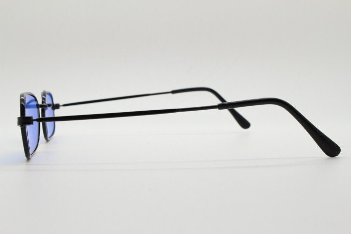 90s vintage minimal metal rectangular sunglasses. Small black frame with striking cobalt blue luxury real glass lenses. NOS