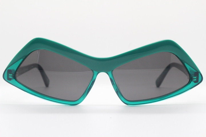 Stella Mc Cartney vintage abstract diamond sunglasses. Blockbuster fashion grail in transparent green acetate with dark lenses. NOS