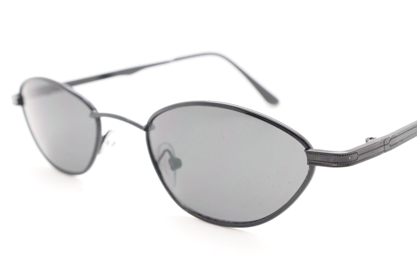 90s vintage low profile sunglasses. Minimal small black angular oval metal frame with matching lenses, Unused. BNWT