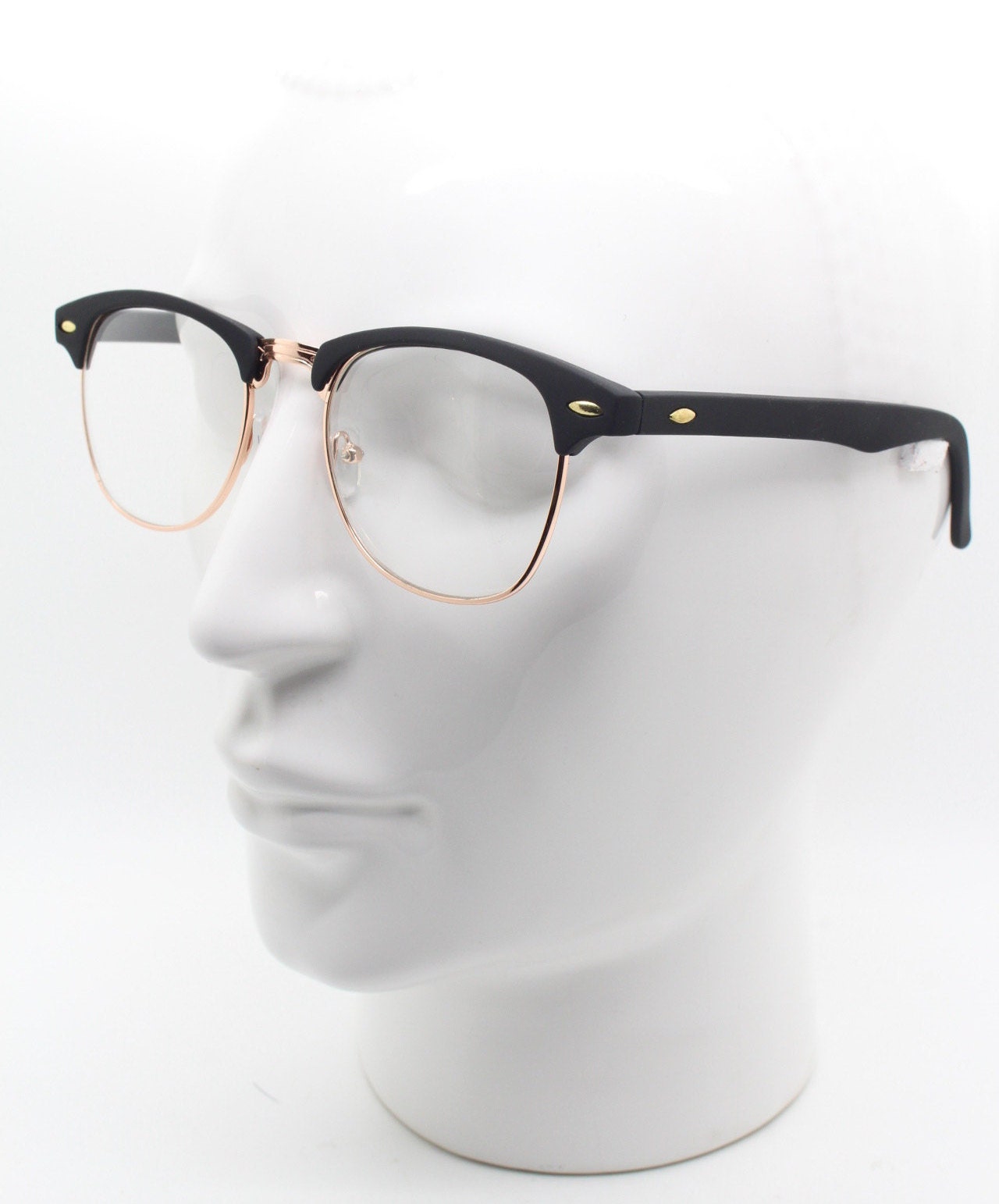 90s vintage browline sunglasses. All time classic design in black gloss finish with gold half rim. 50s, 60s. Unused NOS