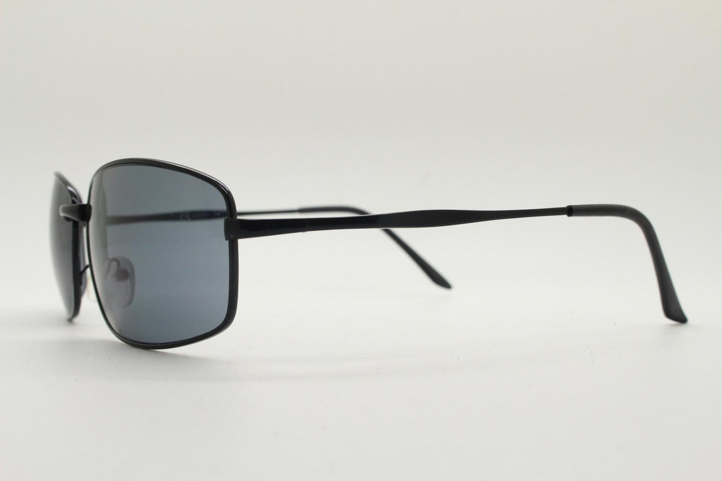 90s vintage wide rectangular sunglasses. Solid metal plain black gloss finish frame with curved lenses. 2000's. Y2K. NOS