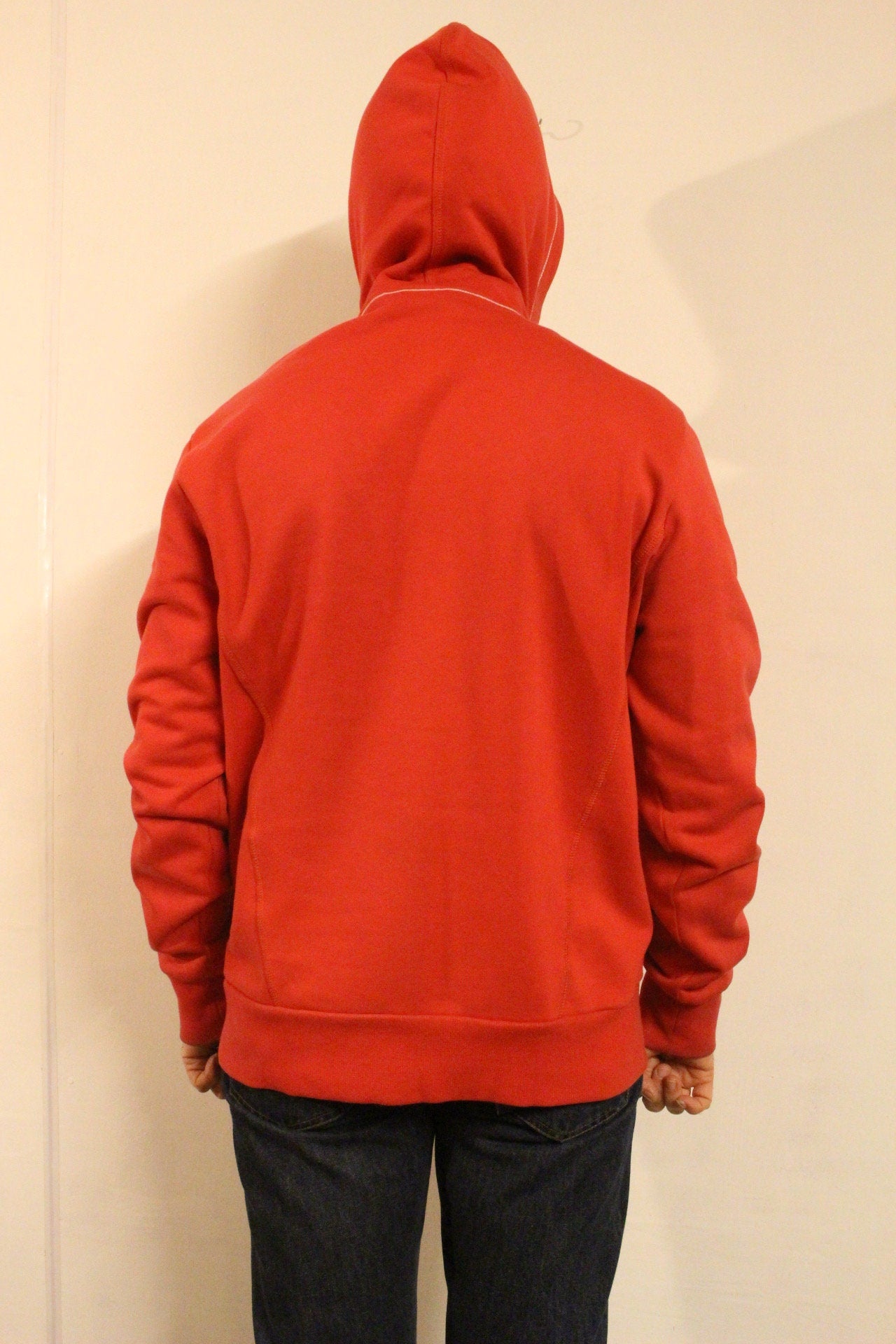 Puma red hoody with big chest logo. Unisex sports pullover sweatshirt with front muffler pockets. UK size L