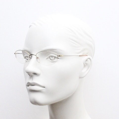 Silhouette oval half frame eye glasses model 6608 made in Austria. Minimal optical frame with extremely flexible wire arms. Prescription RX