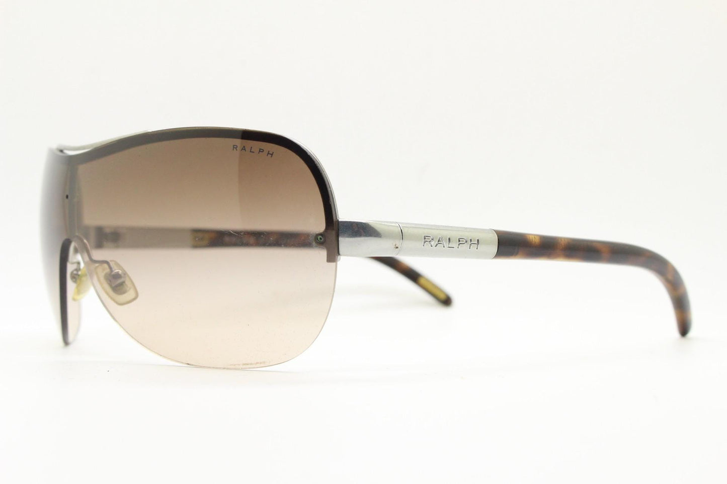 Ralph by Ralph Lauren Y2K vintage big shield sunglasses. 2000's curved wraparound mini mask with graduating mono lens. Aviator