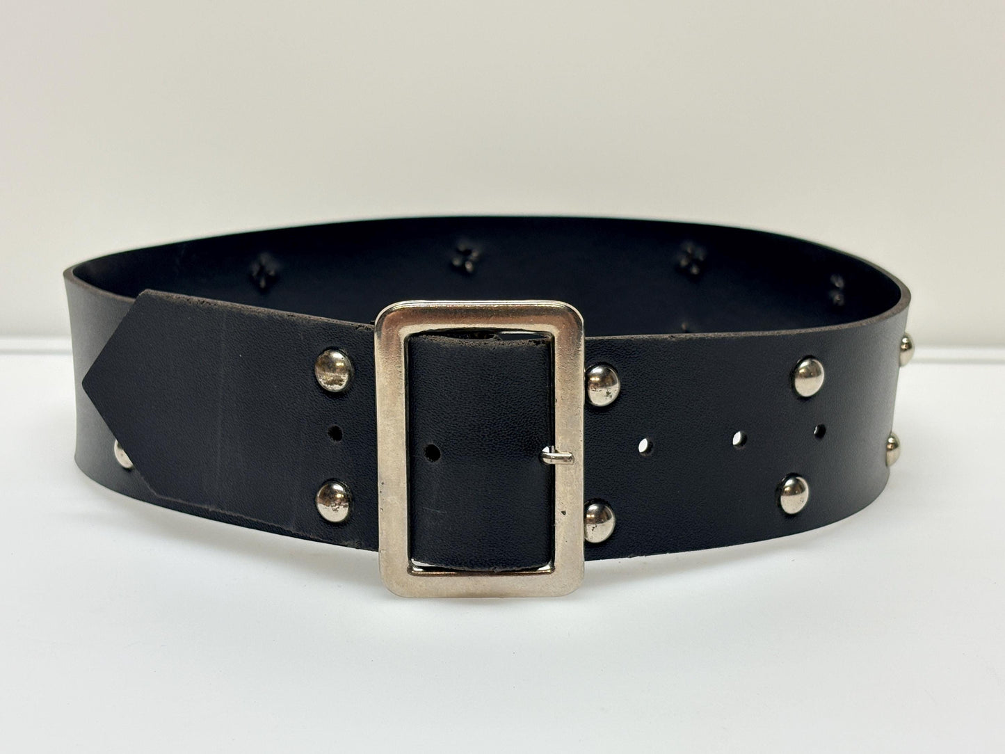 Y2k vintage womens dress belt with flat silver buckle and 2 rows of round domed metal studs. Thick black vinyl 2000s NOS