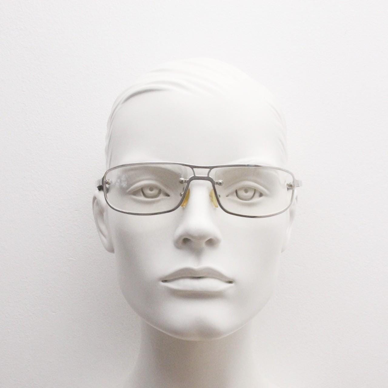 Y2K vintage rectangular aviator sunglasses. Aerodynamic racing style chrome frame  with slight mirror glazed clear lens. 2000's bug eye