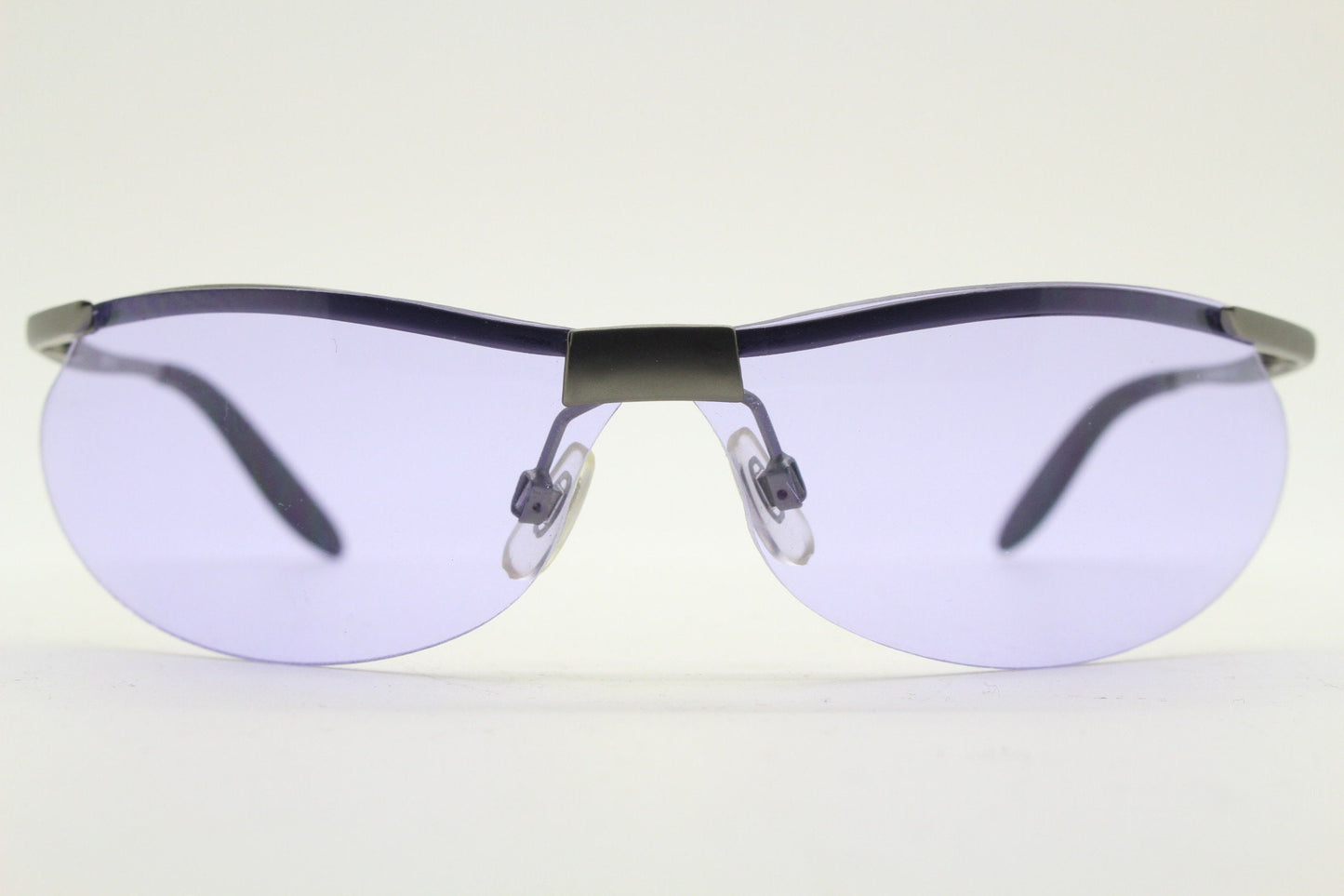 Y2K vintage sport shield sunglasses. 2000's half frame wraparound aerodynamic mini mask visor with purple bug eye lenses. 90s 00s unused NOS