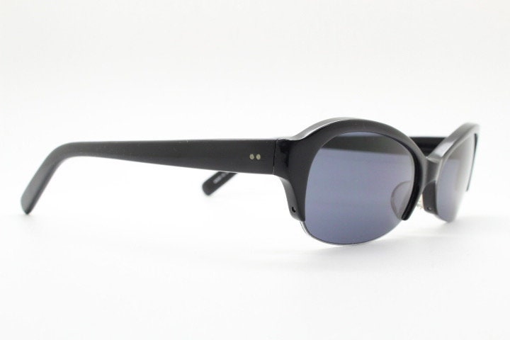 Stylised vintage oval praying mantis cateye sunglasses made in Japan. Superior Japanese black gloss acetate half frame bug eye