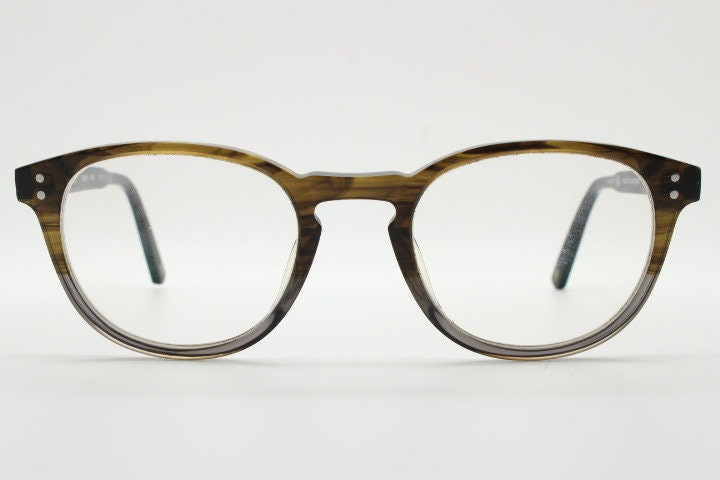 Land Rover vintage round 40s design eye glasses.Mottled brown and grey acetate optical frame with keyhole bridge. Prescription RX