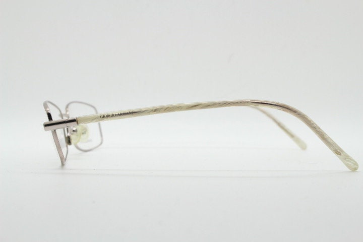 Giorgio Armani 90s vintage oval eye glasses made in Italy. Gold front with marbled white acetate arms. Optical frames. Prescription RX
