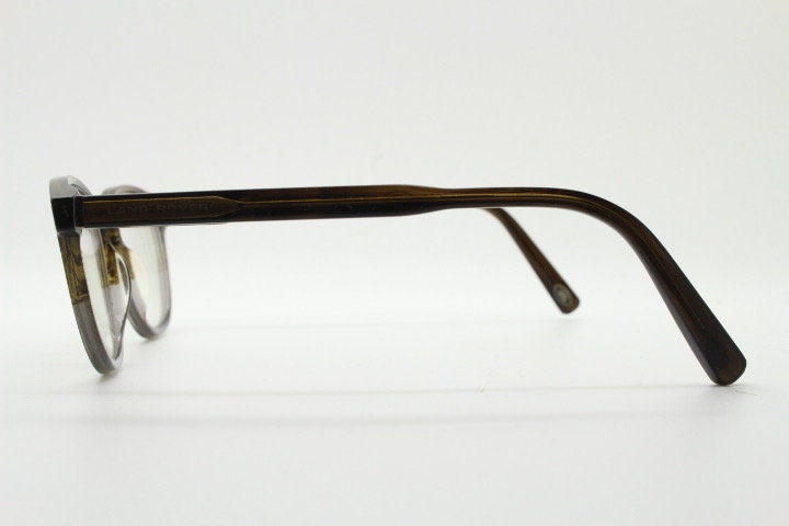 Land Rover vintage round 40s design eye glasses.Mottled brown and grey acetate optical frame with keyhole bridge. Prescription RX
