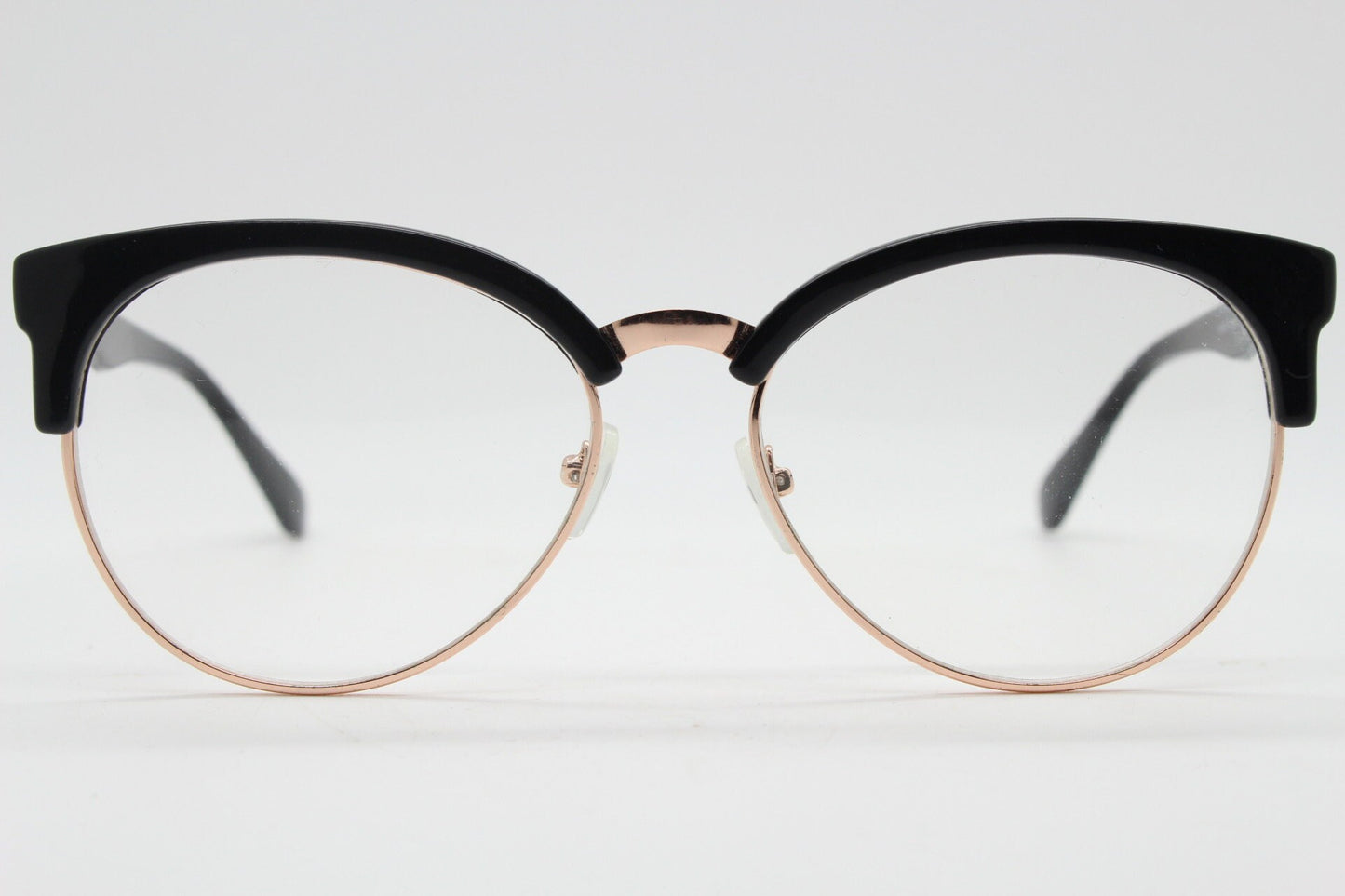 90s vintage modified cat eye glasses. Black gloss browline half frame eyeglasses with gold underwire. 50s, 60s design cateye. NOS
