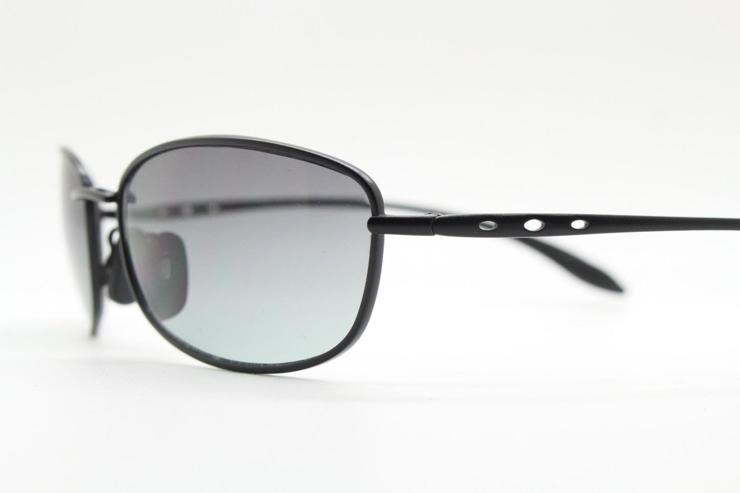 90s vintage curved rectangular sunglasses. Solid metal low profile black matt finish frame with slightly graduating lenses. 2000's. Y2K. NOS