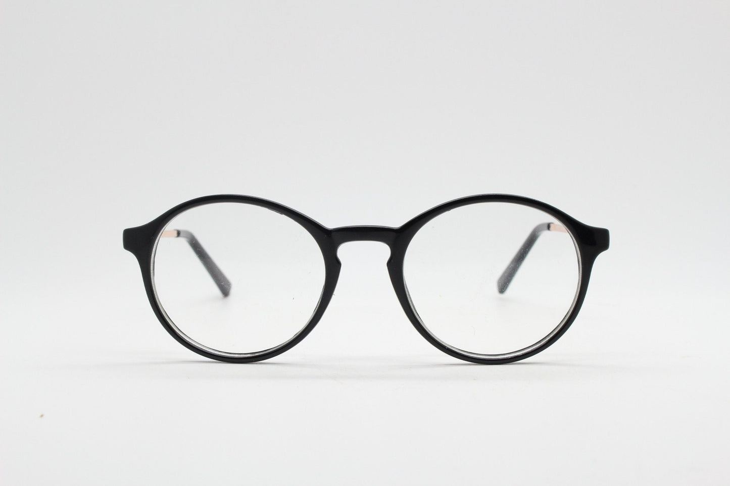 90s vintage round glasses. 30s, 20s style black optical frames with gold arms. Prescription eyeglasses with clear lenses. RX spectacles. NOS