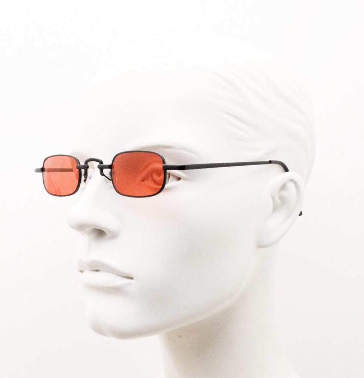 90s vintage small rectangular sunglasses. Imposing minimal black metal victorian style frame with deep red lenses. Unused BNWT