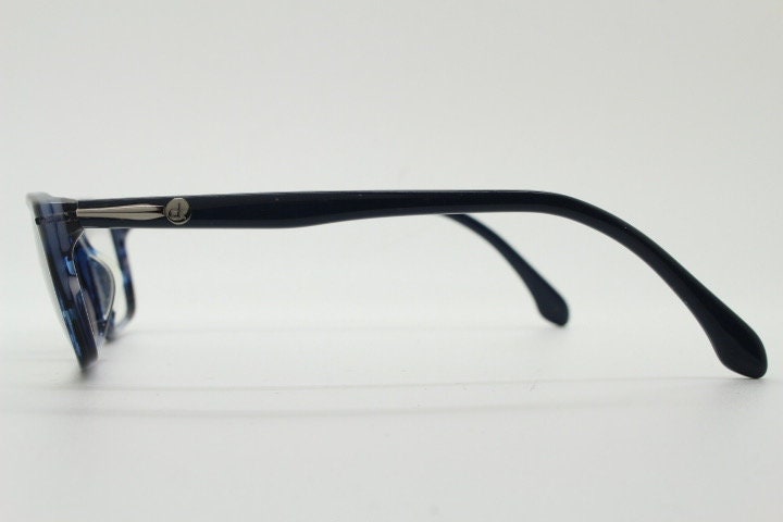Calvin Klein rectangular low profile eye glasses. Dark navy blue gloss acetate optical frames. Prescription eyeglasses. RX