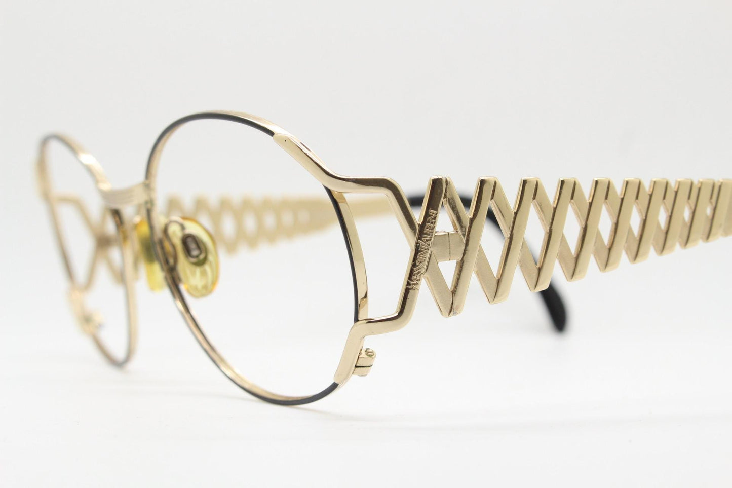 Yves Saint laurent 90s vintage large oval eye glasses made in Italy with incredible zig zag arm design. YSL Prescription RX spectacles
