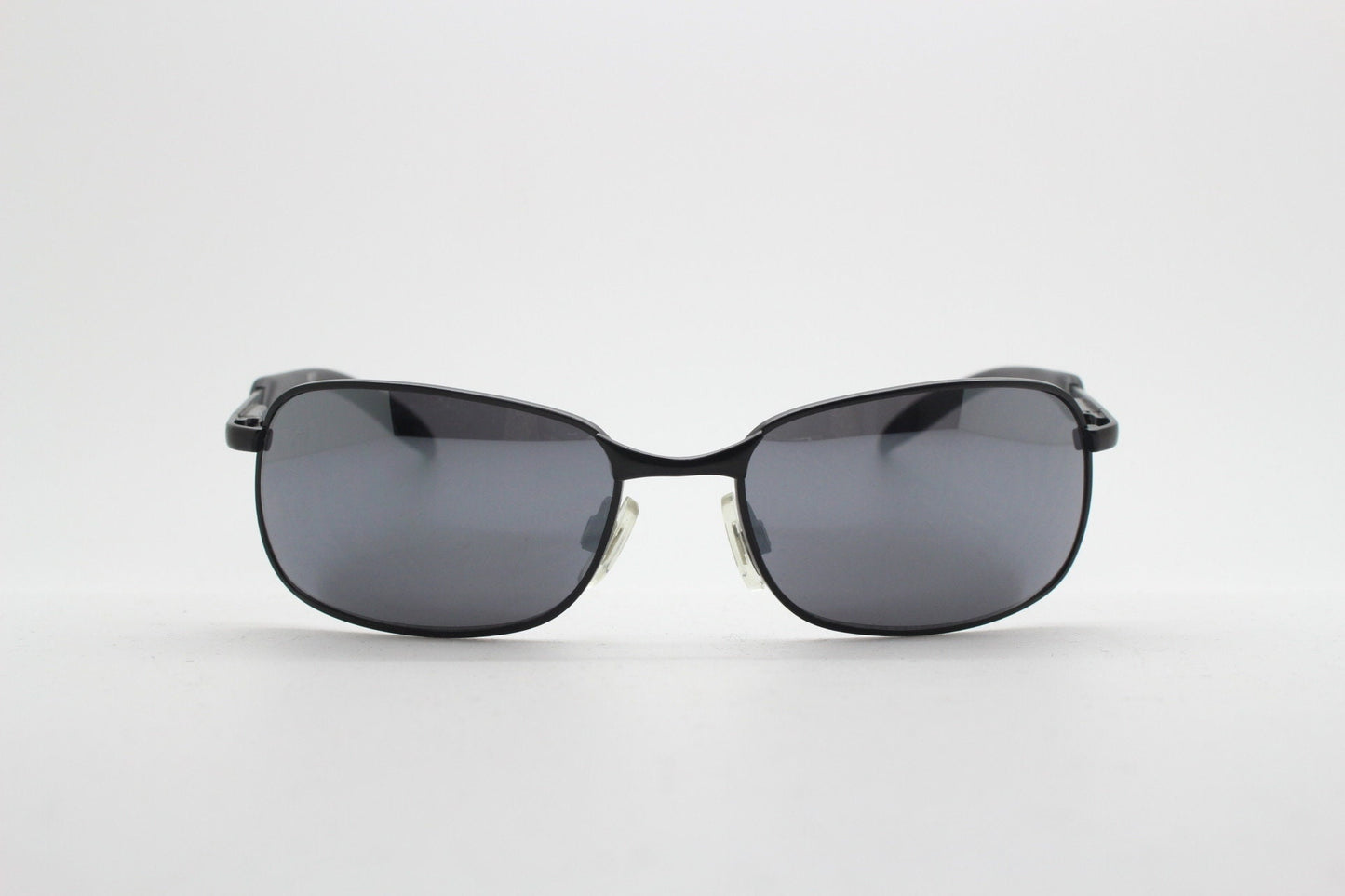 Y2K vintage wraparound sunglasses. Black satin matt finish on rectangular frame with slight mirror glaze lenses. 2000's. 90s. Unused NOS