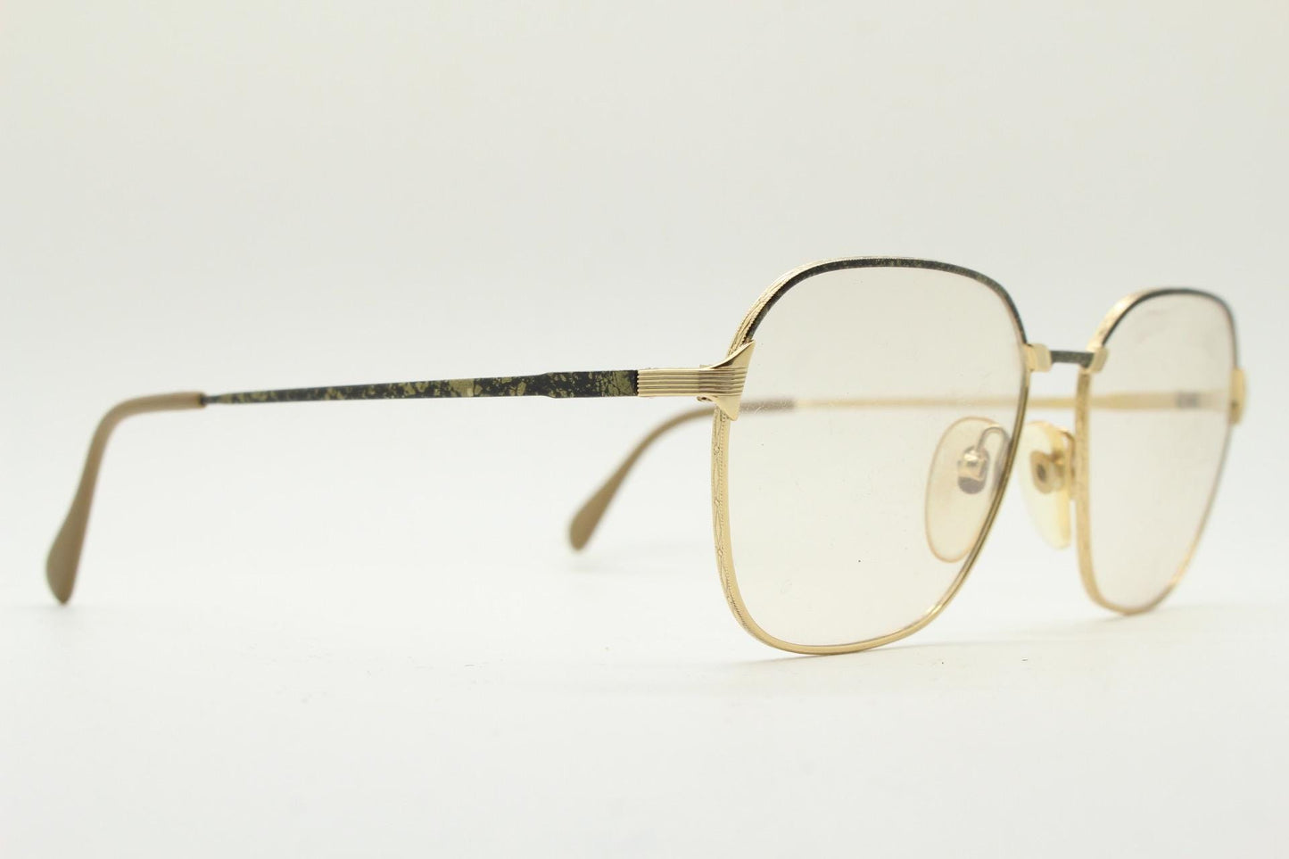 80s vintage square eye glasses made in Italy by Studio. Black and gold patterned metal optical frames in neat proportions. Unused NOS
