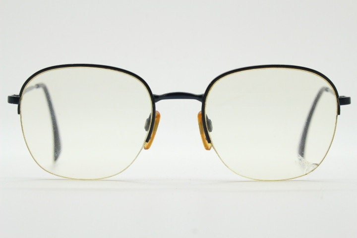 Giorgio Armani round eye glasses made in Italy. Minimal black satin finish half frame spectacles. Prescription optical eyeglasses. RX