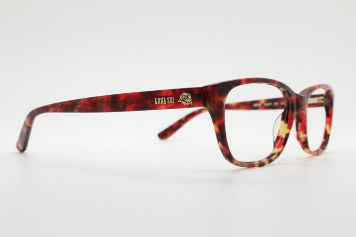 Anna Sui modified wayfarer design eye glasses. Superb marbled acetate optical frames with red tones. Prescription RX vintage eyeglasses