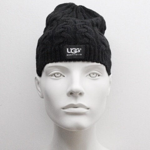 Ugg Australia plain black knitted beanie hat. Aran pattern weave with ribbed edge. Pull down cap. BNWT