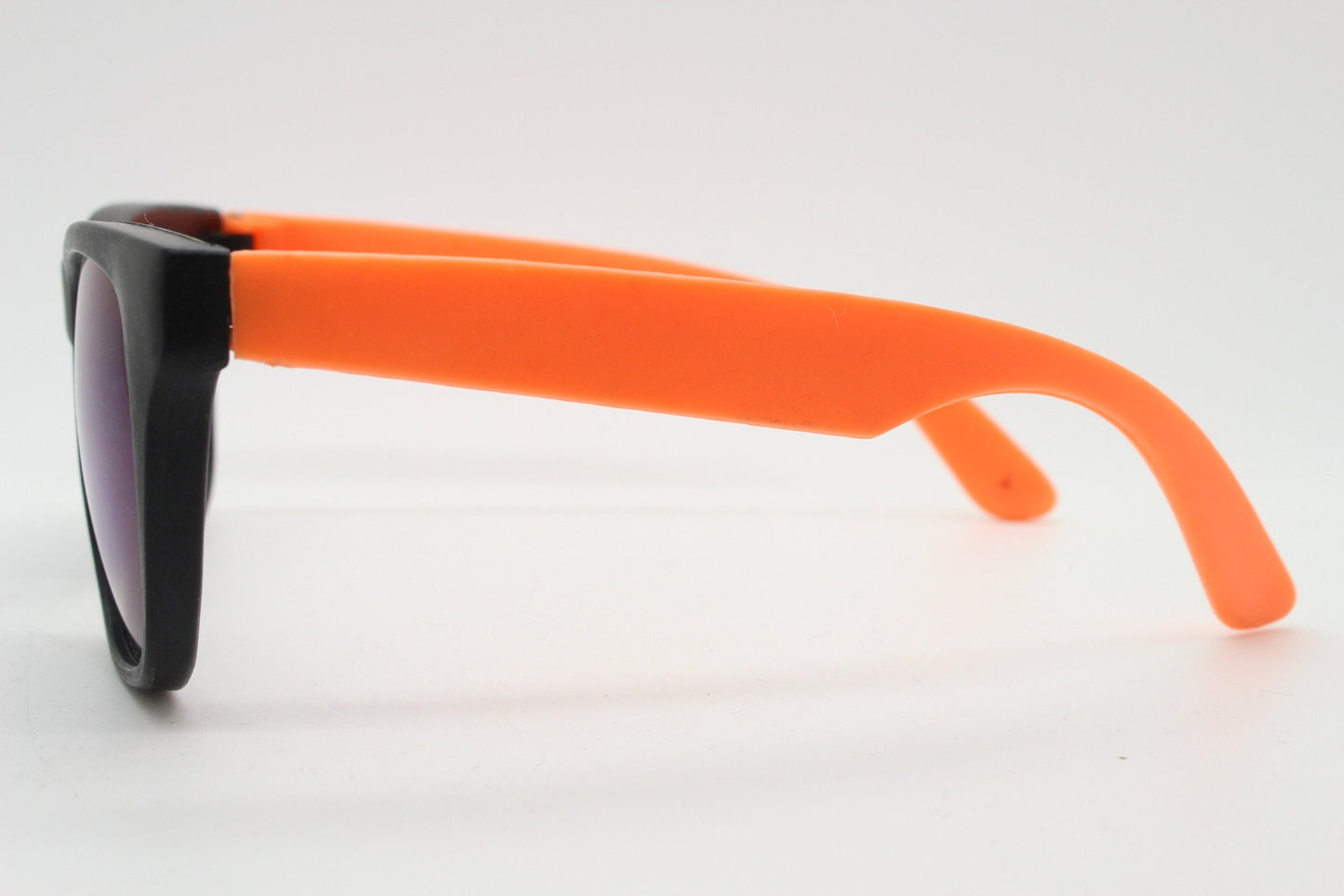 80s vintage 2 tone wayfarer style sunglasses. Matt black flexible rubber frame with orange dayglo arms. Unused NOS. Y2K fluorescent rave