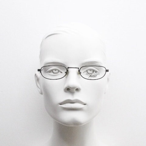 Alberta Ferretti 90s vintage oval eye glasses made in Italy. Small grey metal optical frame with ornate arm pattern. Prescription RX. NOS
