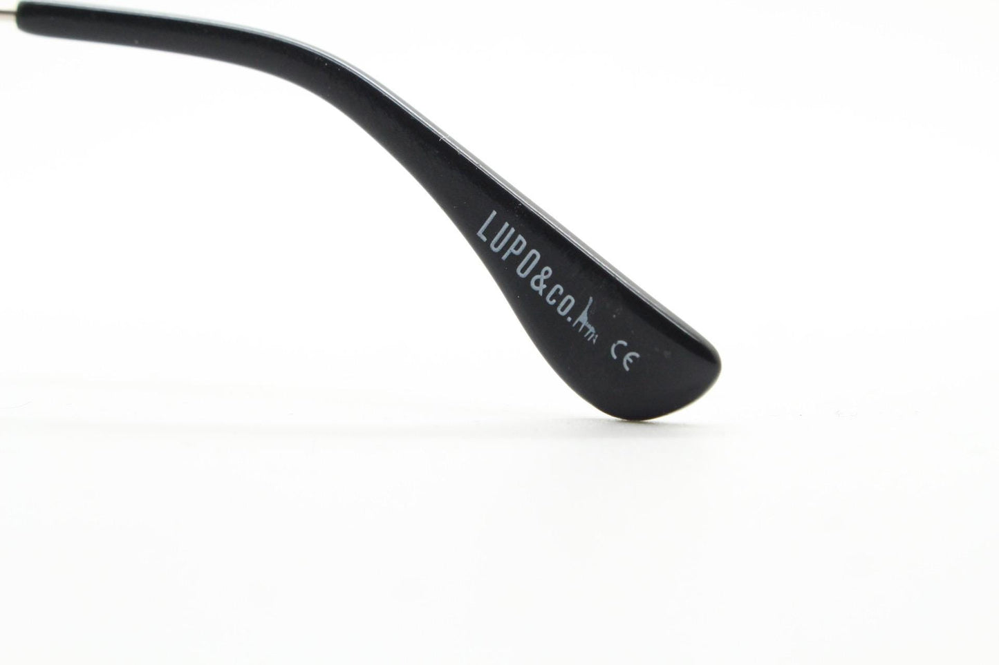 Lupo and Co round eye glasses with pointed corners. Flat metal silver optical frames with black browline. Prescription eyeglasses. RX