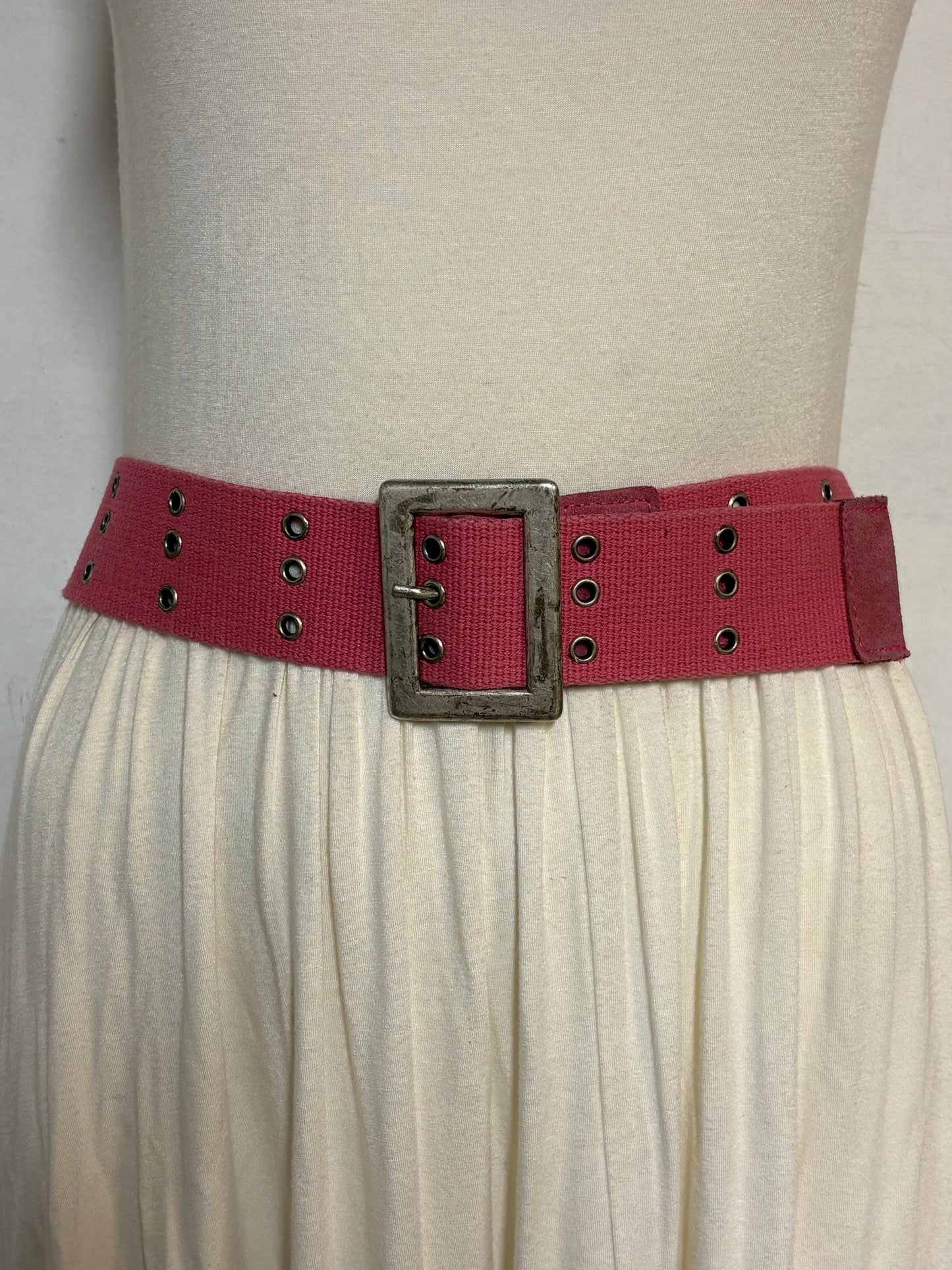 Y2k vintage thick candy pink army style belt with distressed metal buckle and 3 rows of lace holes. Statement feature / to cinch a dress