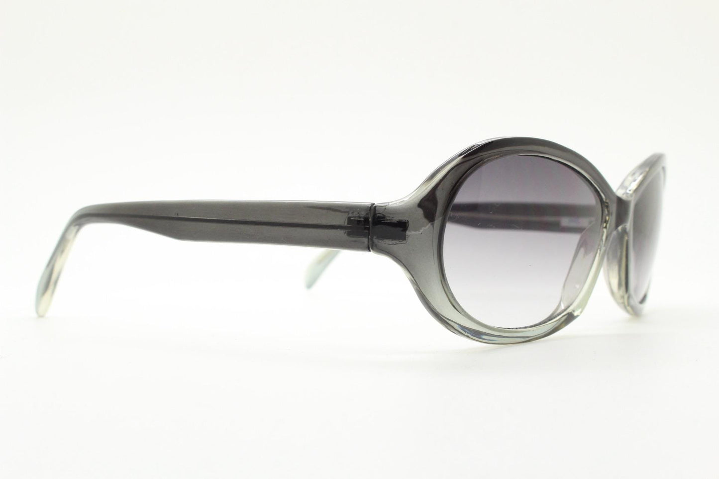 Y2K vintage oval bug eye sunglasses. Tasteful transparent grey acetate frame with matching graduated lenses. 2000s NOS. BNWT