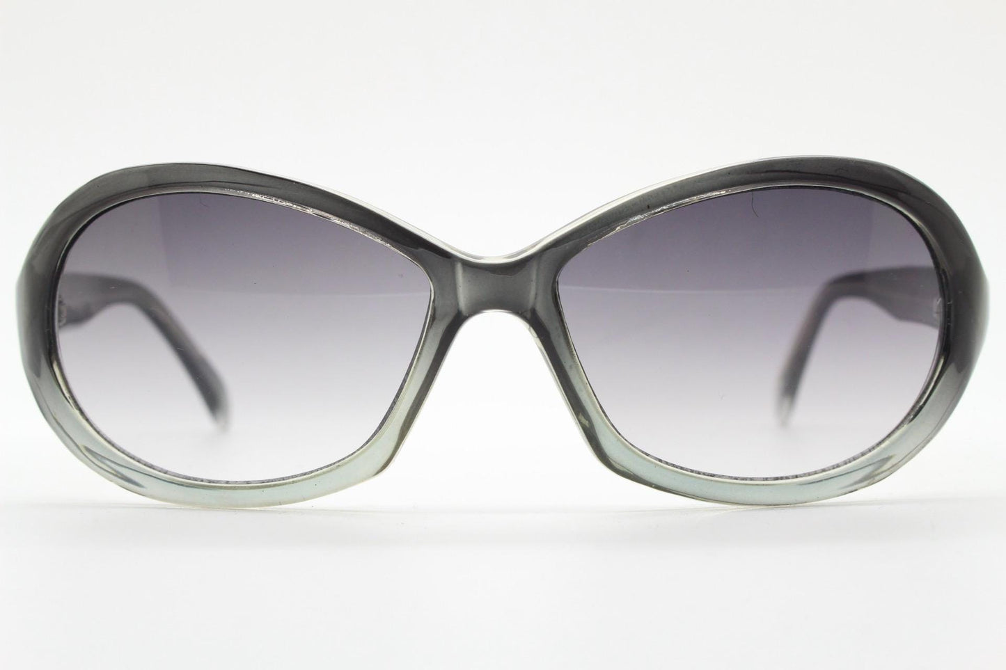 Y2K vintage oval bug eye sunglasses. Tasteful transparent grey acetate frame with matching graduated lenses. 2000s NOS. BNWT