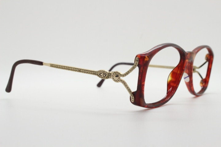 Christian Dior 80s vintage rectangular eye glasses made in Germany from Optyl. Striking marbled amber acetate optical frame. Prescription RX