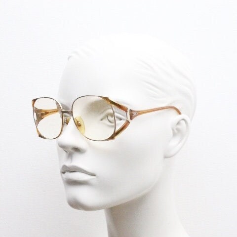 Christian Dior 70s vintage round eyeglasses model 2524 made in Germany from Optyl. Transparent brown optical frame. Prescription eyeglasses