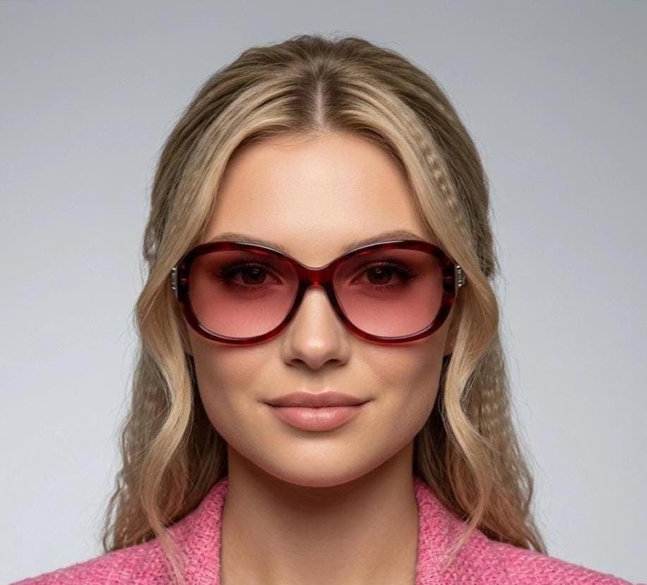 Y2k vintage big bug eye sunglasses. Womens transparent red oversized frame with fabulous pink graduating lenses and metal arm crest. 2000s