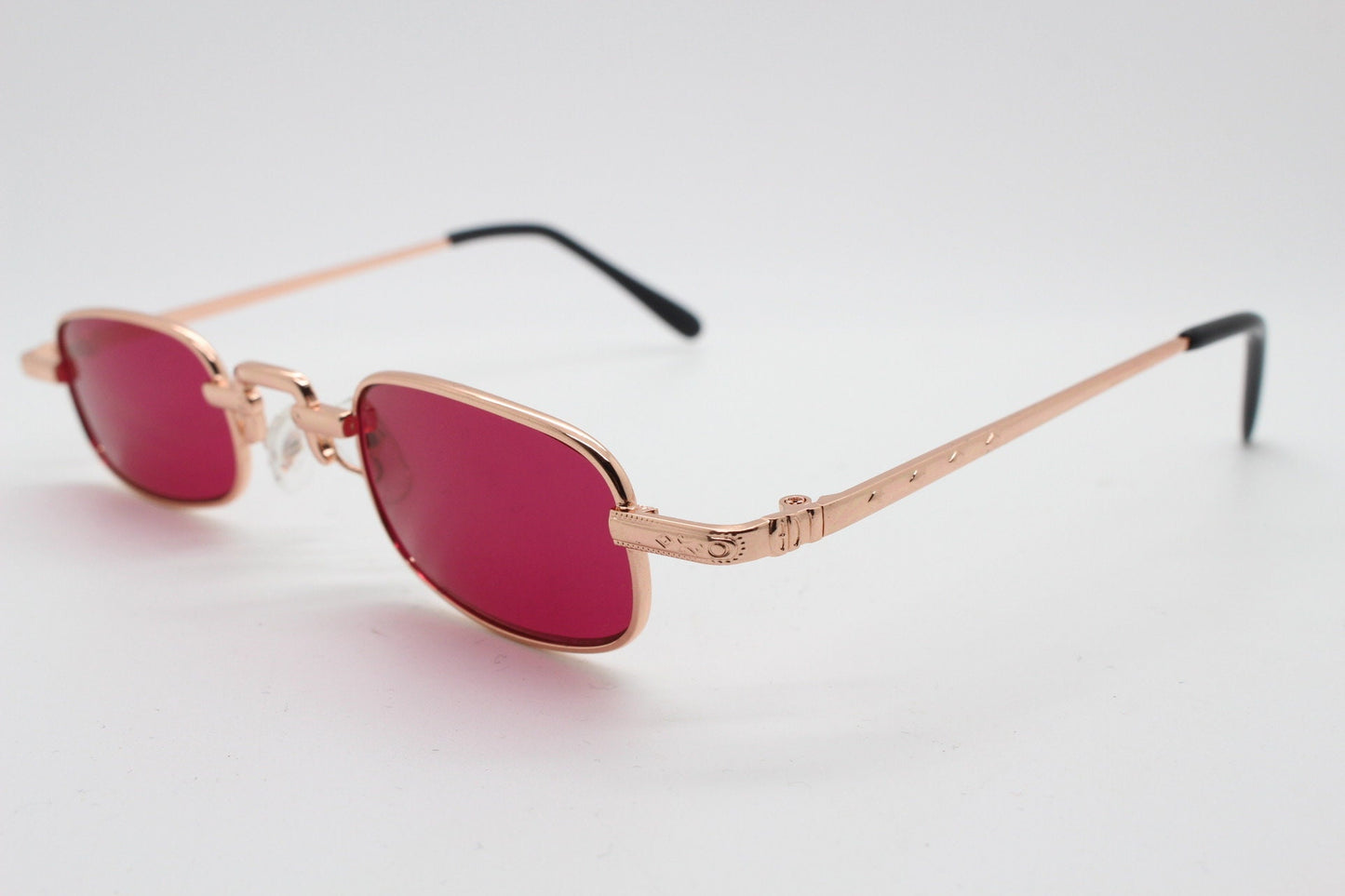 90s vintage small rectangular sunglasses. Imposing minimal gold metal victorian design frame with shocking pink lenses. Unused BNWT