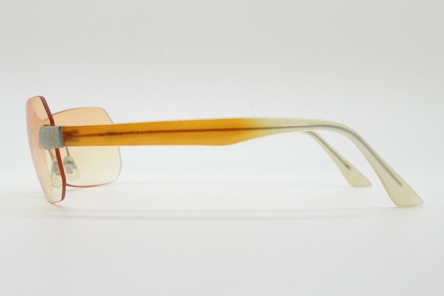 Y2K vintage frameless shield sunglasses. Dynamic 2000's light tone orange mono lens visor with matt silver trim. 00's Cosplay mini mask. NOS